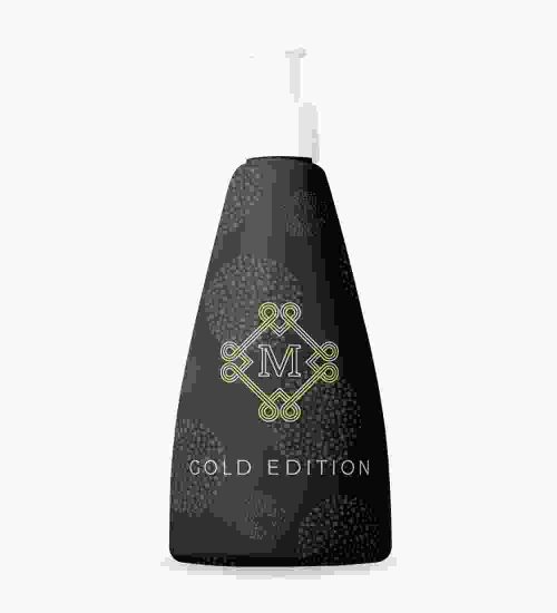 A black bottle with a gold emblem on it.
